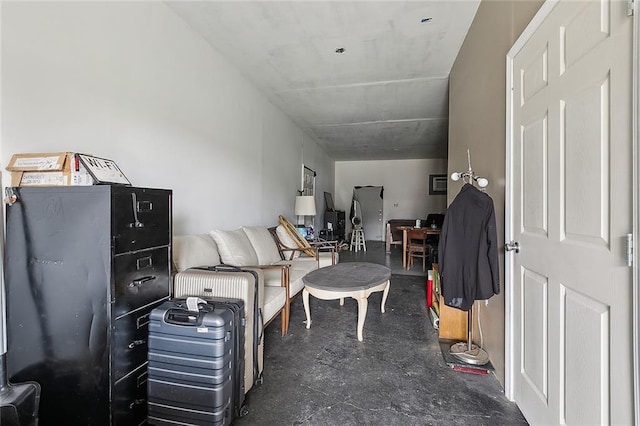 interior space featuring finished concrete flooring