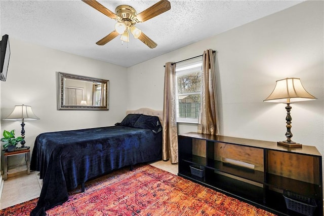 bedroom featuring a textured ceiling