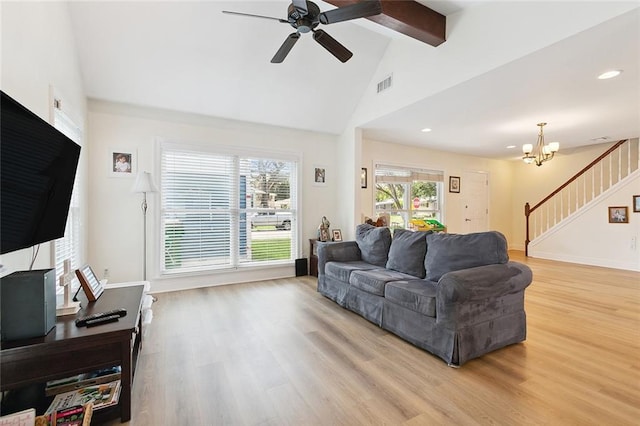 10053 Joel Ave, River Ridge, LA 70123 - living area with stairs, recessed lighting, ceiling fan with notable chandelier, visible vents, and light wood-style flooring