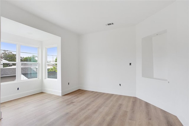 10053 Joel Ave, River Ridge, LA 70123 - unfurnished room featuring baseboards, light wood-style floors, and visible vents