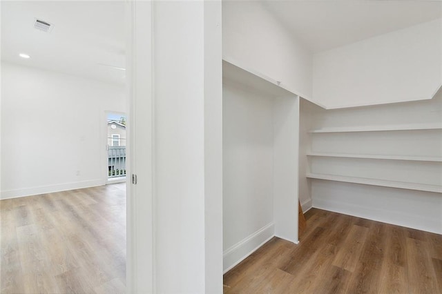 10053 Joel Ave, River Ridge, LA 70123 - walk in closet featuring wood finished floors and visible vents