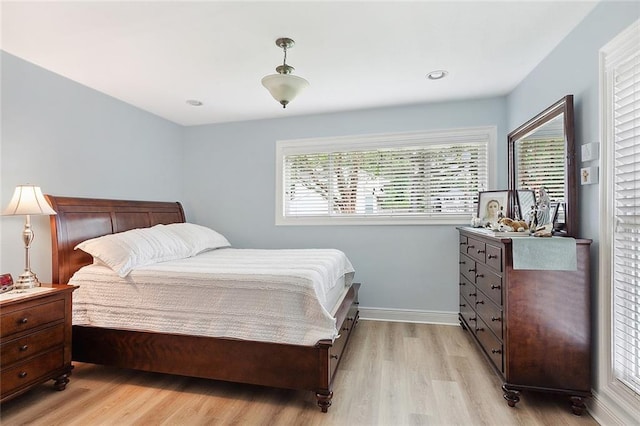 10053 Joel Ave, River Ridge, LA 70123 - bedroom with baseboards, light wood finished floors, and recessed lighting