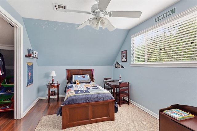10053 Joel Ave, River Ridge, LA 70123 - bedroom with baseboards, visible vents, wood finished floors, and vaulted ceiling