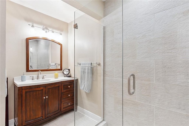 10053 Joel Ave, River Ridge, LA 70123 - bathroom with a shower stall, baseboards, and vanity