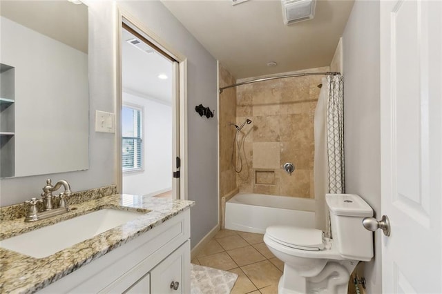 bathroom with toilet, tile patterned floors, visible vents, vanity, and shower / tub combo with curtain