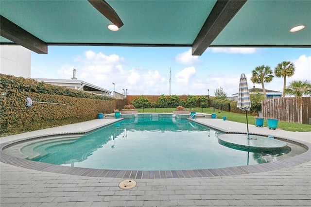 view of swimming pool with a fenced backyard and a fenced in pool