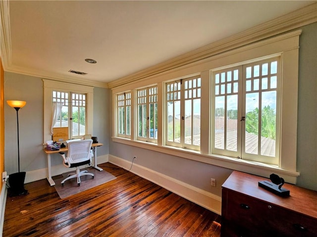 office featuring dark wood-style floors, baseboards, visible vents, and crown molding