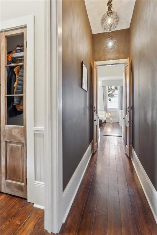 717 Port St, New Orleans, LA 70117 - corridor featuring dark wood-type flooring