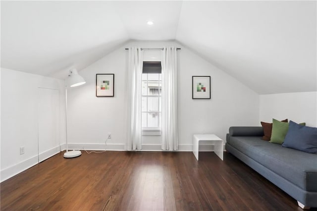 717 Port St, New Orleans, LA 70117 - bonus room with baseboards, lofted ceiling, and wood finished floors