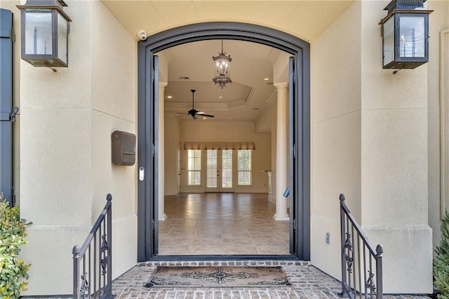 property entrance with stucco siding