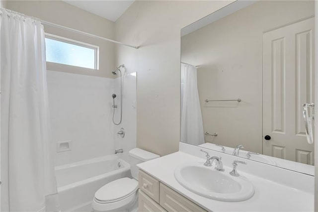 full bath featuring toilet, shower / bath combination with curtain, and vanity