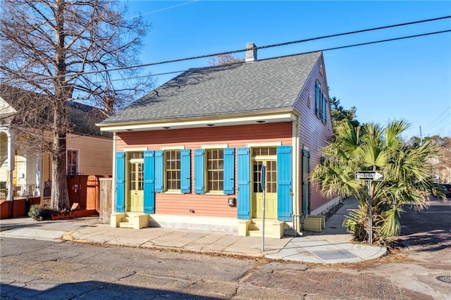 3829 Dauphine St, New Orleans, LA 70117 - view of front of home featuring roof with shingles