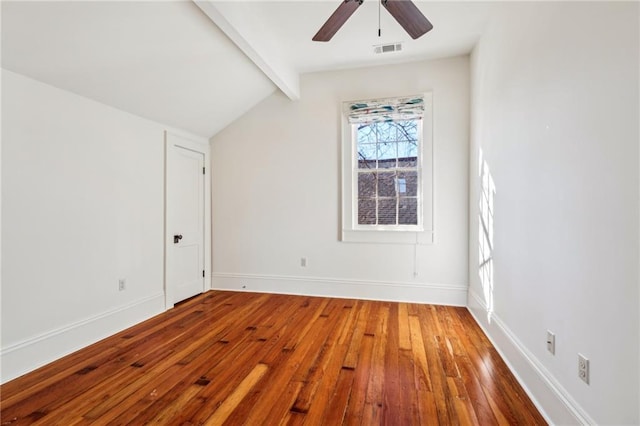 additional living space featuring lofted ceiling with beams, baseboards, visible vents, and wood finished floors