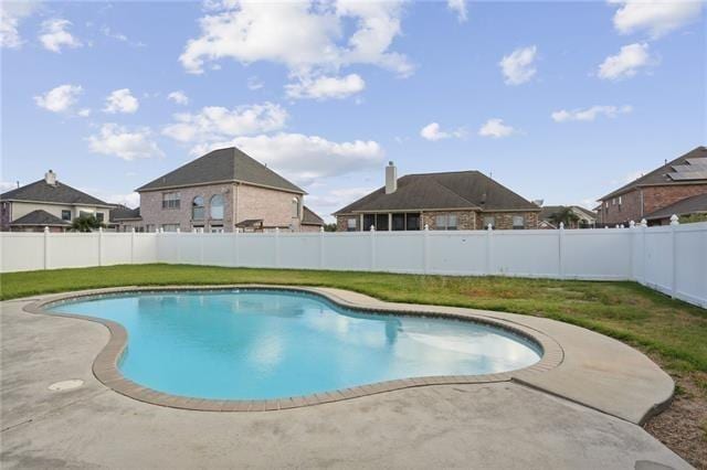 view of swimming pool featuring a patio, a fenced backyard, and a fenced in pool