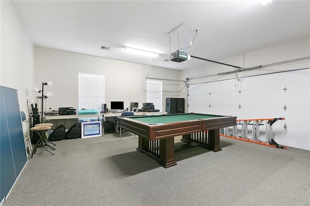 playroom featuring a garage, carpet flooring, and visible vents