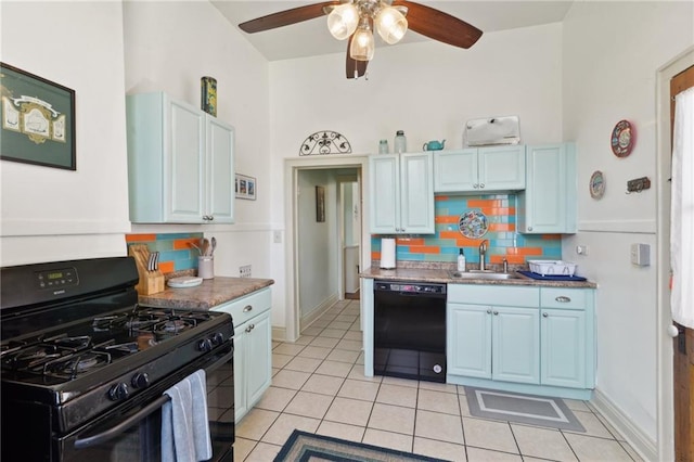 kitchen featuring tasteful backsplash, a sink, black appliances, and light tile patterned floors