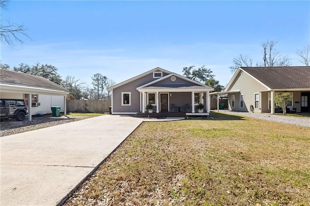 exterior space with covered porch and a yard