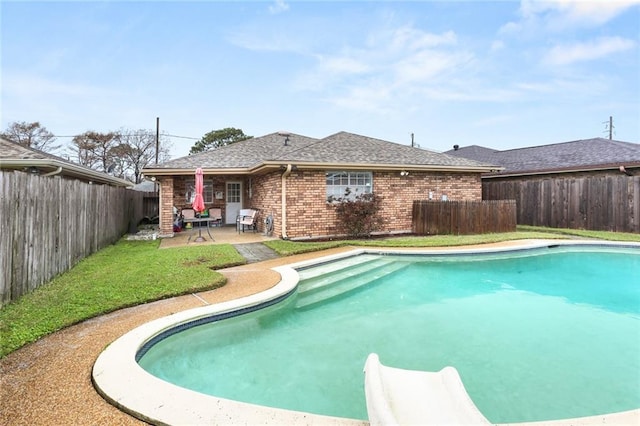 view of pool with a patio area, a fenced backyard, and a fenced in pool