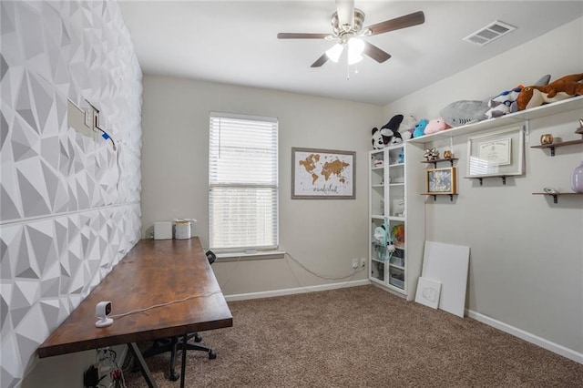 office area with carpet, visible vents, ceiling fan, and baseboards