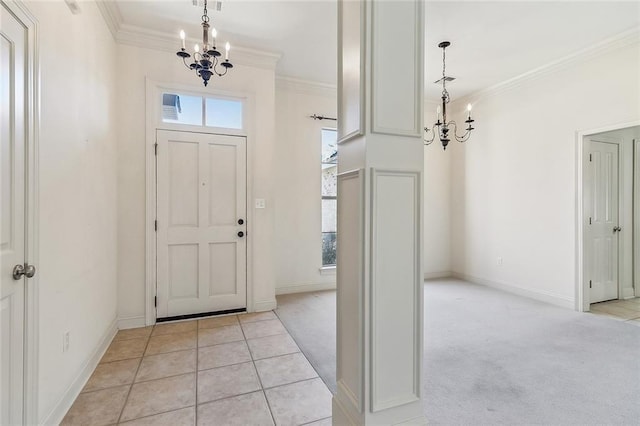 entryway with light carpet, an inviting chandelier, baseboards, and ornamental molding