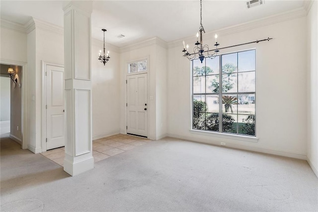 foyer with crown molding, light colored carpet, a notable chandelier, and visible vents