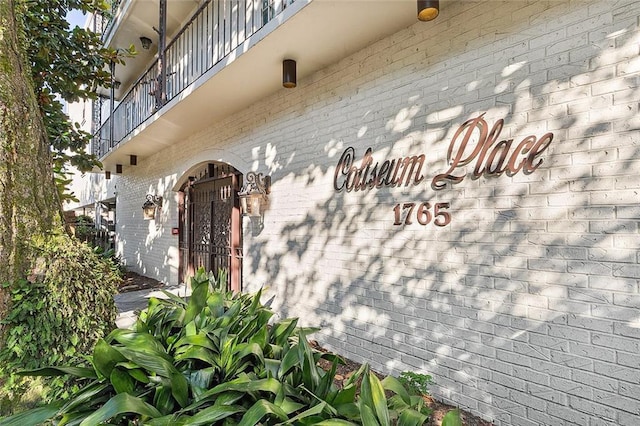 property entrance with brick siding