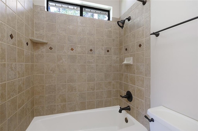 full bathroom featuring toilet and tub / shower combination