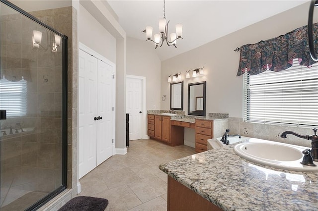 full bathroom with lofted ceiling, a chandelier, tile patterned flooring, vanity, and a shower stall