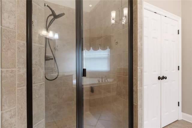 bathroom with a shower stall