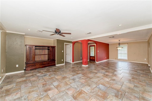 4 Silman Dr, Hammond, LA 70401 - unfurnished living room with baseboards, arched walkways, a ceiling fan, stone tile flooring, and crown molding