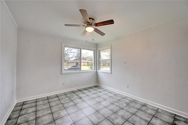 unfurnished room featuring ornamental molding, a ceiling fan, and baseboards