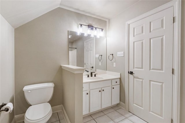 full bathroom with tile patterned flooring, vaulted ceiling, vanity, and toilet