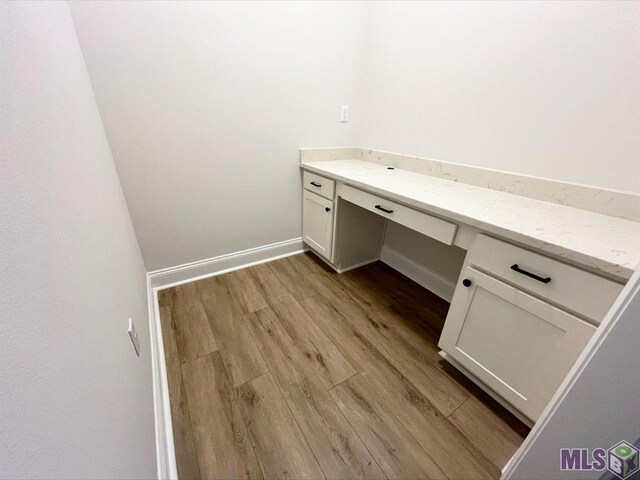 bathroom with wood finished floors