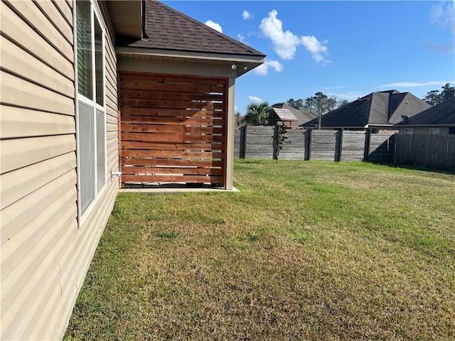 view of yard featuring a fenced backyard