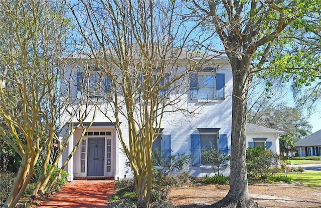 view of front of property with brick siding