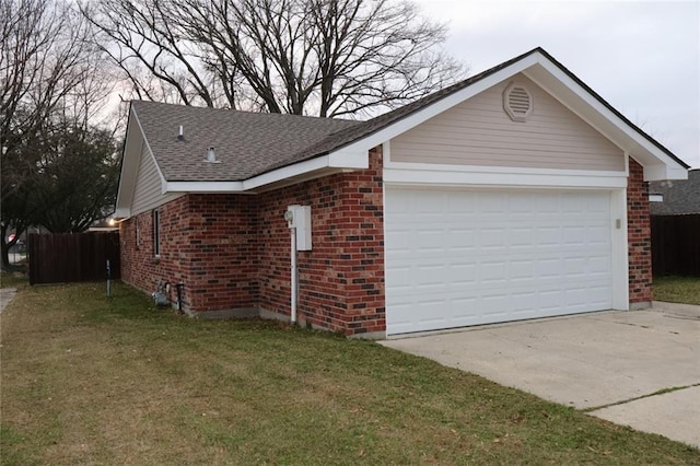 view of side of home with a garage, concrete driveway, and brick siding