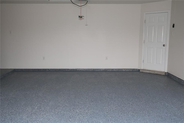 garage with baseboards