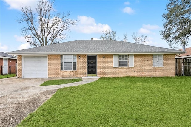 single story home featuring driveway, an attached garage, a shingled roof, and a front yard