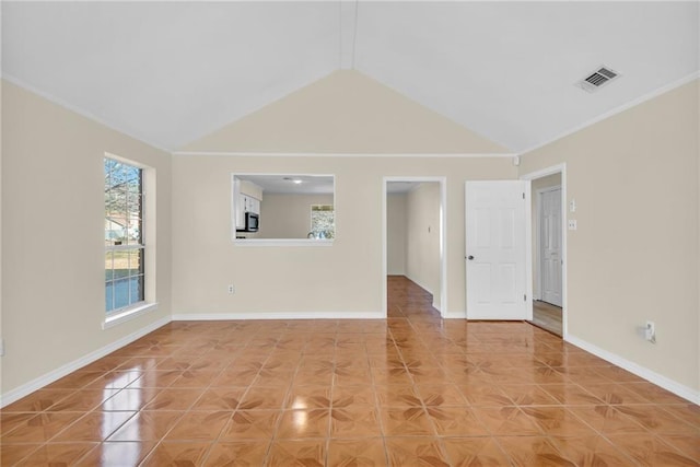 empty room featuring high vaulted ceiling, baseboards, visible vents, and light tile patterned flooring