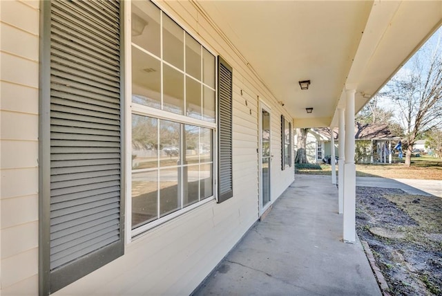 view of patio featuring a porch