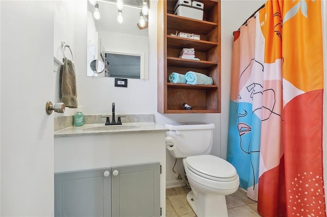 full bathroom with tile patterned flooring, toilet, vanity, baseboards, and a shower with curtain