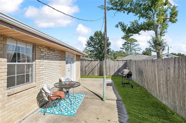 view of patio / terrace with a fenced backyard