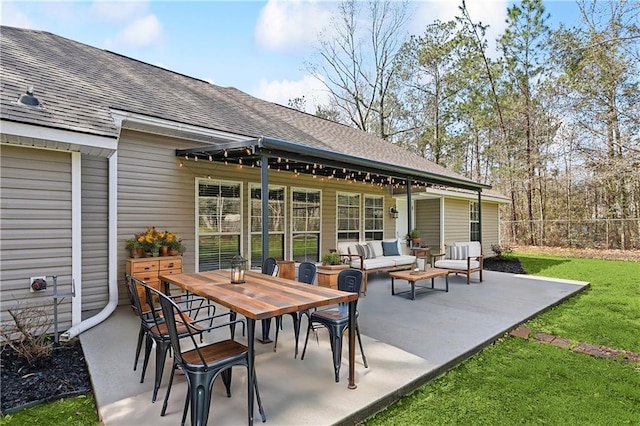 view of patio with fence and an outdoor hangout area