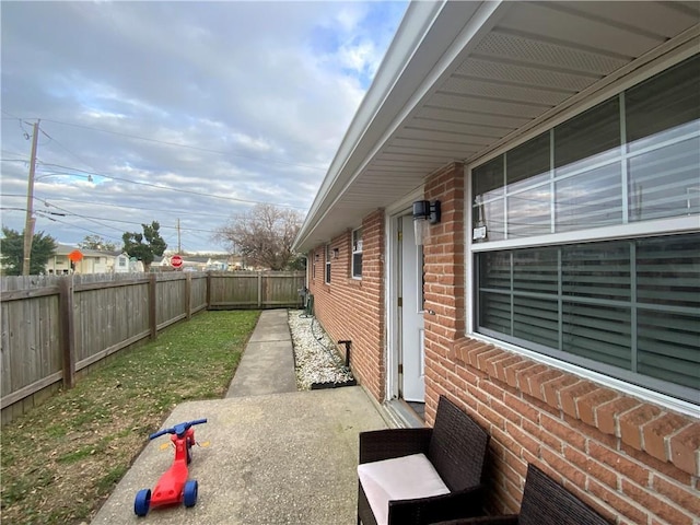 view of patio with a fenced backyard