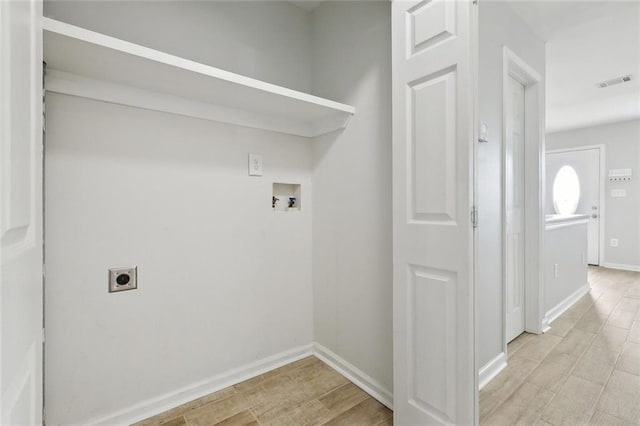 washroom featuring laundry area, visible vents, hookup for a washing machine, wood tiled floor, and hookup for an electric dryer