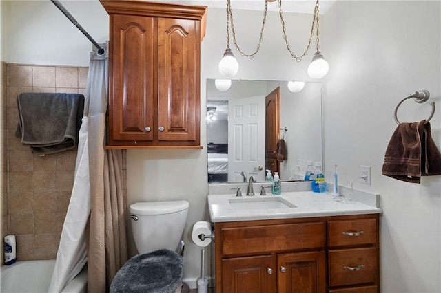 bathroom featuring ensuite bathroom, toilet, vanity, and shower / tub combo with curtain