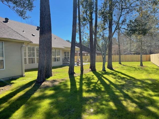 view of yard featuring fence