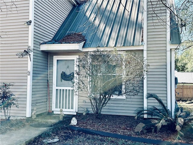 property entrance featuring fence