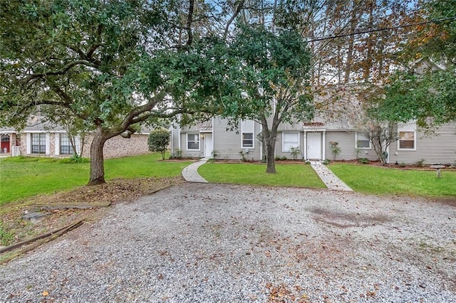 view of front of property with a front lawn