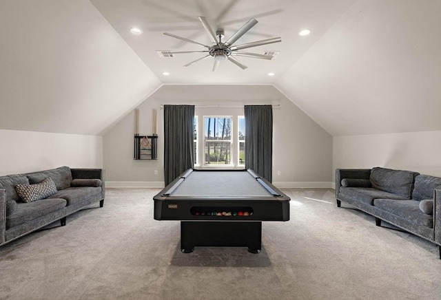 game room featuring baseboards, lofted ceiling, visible vents, and light colored carpet